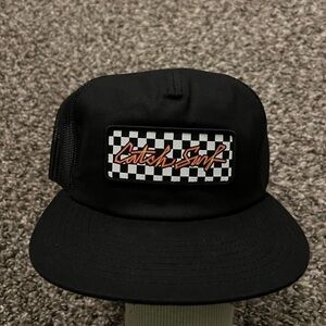 American Needle Black Hat with Checkered Surf Patch